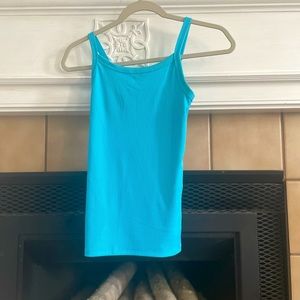 I am selling a tank top from target. The color is a brighter blue.
